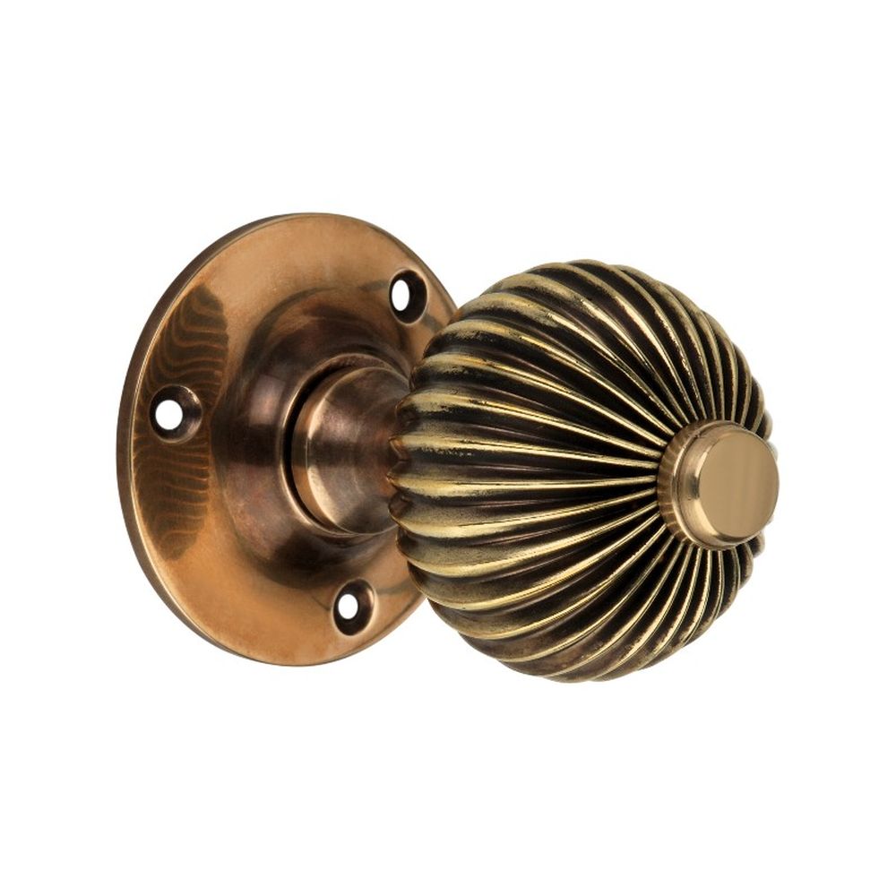 This is an image of Spira Brass - Regency Mortice Door Knob Aged Brass   available to order from trade door handles, quick delivery and discounted prices.