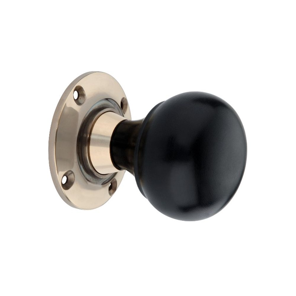 This is an image of Spira Brass - Ebony Bun Rim/Mortice Door Knob Aged Brass   available to order from trade door handles, quick delivery and discounted prices.