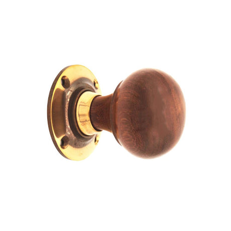 This is an image of Spira Brass - Rosewood Bun Rim/Mortice Door Knob Aged Brass   available to order from trade door handles, quick delivery and discounted prices.