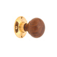 This is an image of Spira Brass - Rosewood Bun Rim/Mortice Door Knob Polished Brass   available to order from trade door handles, quick delivery and discounted prices.