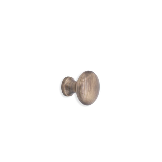 This is an image of Spira Brass - Mushroom 25mm Cupboard Knob Antique   available to order from trade door handles, quick delivery and discounted prices.