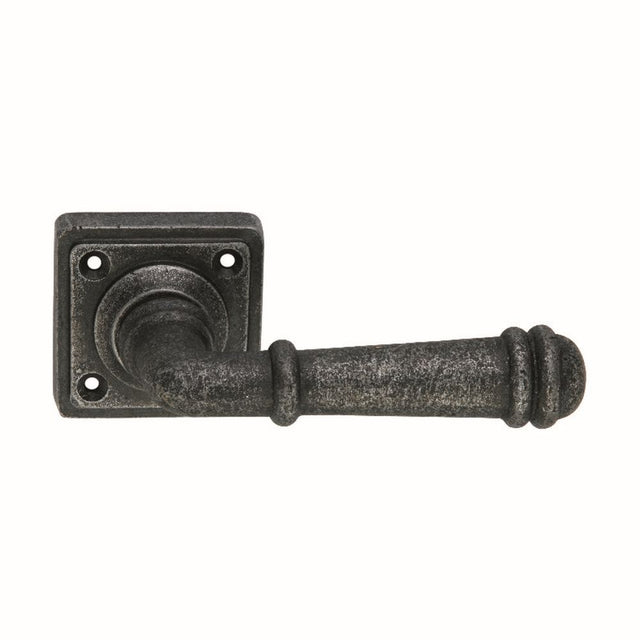 This is an image of Spira Brass - Ribbed Lever on Square Rose Pewter   available to order from trade door handles, quick delivery and discounted prices.