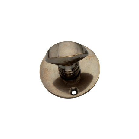 This is an image of Spira Brass - Lady Turn & Release Antique Brass   available to order from trade door handles, quick delivery and discounted prices.