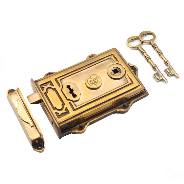 This is an image of Spira Brass - Davenport Rim Lock Aged Brass   available to order from trade door handles, quick delivery and discounted prices.