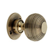 This is an image of Spira Brass - Beehive 50mm Rim/Mortice Door Knob Aged Brass   available to order from trade door handles, quick delivery and discounted prices.