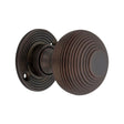 This is an image of Spira Brass - Beehive 50mm Rim/Mortice Door Knob Aged Bronze   available to order from trade door handles, quick delivery and discounted prices.