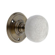 This is an image of Spira Brass - Crackled Porcelain Mortice Door Knob Antique   available to order from trade door handles, quick delivery and discounted prices.