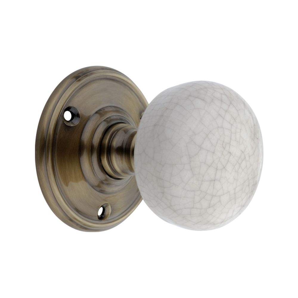 This is an image of Spira Brass - Crackled Porcelain Mortice Door Knob Antique   available to order from trade door handles, quick delivery and discounted prices.