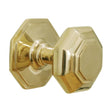 This is an image of Spira Brass - Octagonal Centre Door Knob Polished Brass   available to order from trade door handles, quick delivery and discounted prices.