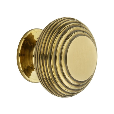 This is an image of Spira Brass - Beehive Large 40mm Cupboard Knob Aged Brass   available to order from trade door handles, quick delivery and discounted prices.