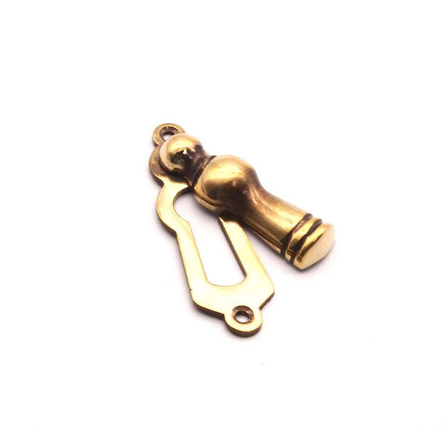 This is an image of Spira Brass - Lady Escutcheon Aged Brass   available to order from trade door handles, quick delivery and discounted prices.