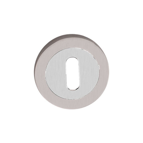 This is an image of Spira Brass - Oval Standard Escutcheon Dual Tone   available to order from trade door handles, quick delivery and discounted prices.