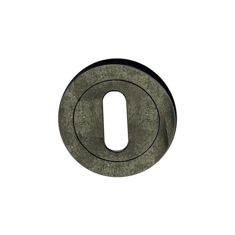 This is an image of Spira Brass - Oval Standard Escutcheon Pewter   available to order from trade door handles, quick delivery and discounted prices.