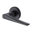 This is an image of a Sorrento - Door Handle Lever Latch on Round Rose Amalfi Design Matt Black Finish, sc-2059-blk that is available to order from Trade Door Handles in Kendal.