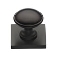 This is an image of a Heritage Brass - Cabinet Knob Domed Design with Square Backplate 32mm Matt Bronz, sq3950-mb that is available to order from Trade Door Handles in Kendal.