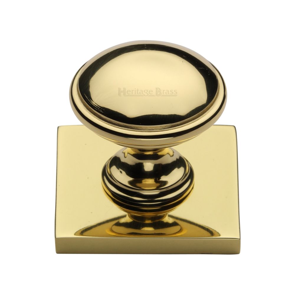 This is a image of a Heritage Brass - Cabinet Knob Domed Design with Square Backplate 32mm Pol. Brass that is available to order from Trade Door Handles in Kendal