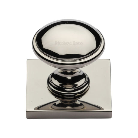 This is an image of a Heritage Brass - Cabinet Knob Domed Design with Square Backplate 32mm Polished Nicke, sq3950-pnf that is available to order from Trade Door Handles in Kendal.