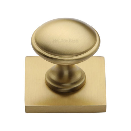 This is an image of a Heritage Brass - Cabinet Knob Domed Design with Square Backplate 32mm Satin Brass, sq3950-sb that is available to order from Trade Door Handles in Kendal.