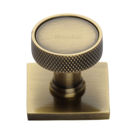 This is an image of a Heritage Brass - Cabinet Knob Florence Knurled Design with Square Backplate 32mm, sq4648-at that is available to order from Trade Door Handles in Kendal.