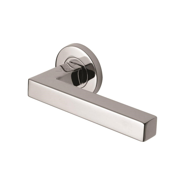 This is an image of a Steel Line Door Handle Lever Latch on Round Rose Tube Design Polished Stainless Steel finish, ss-601-p that is available to order from Trade Door Handles in Kendal.