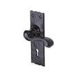 This is an image of a The Tudor Collection - Door Handle Lever Lock Shropshire Design Black Iron, tc100 that is available to order from Trade Door Handles in Kendal.