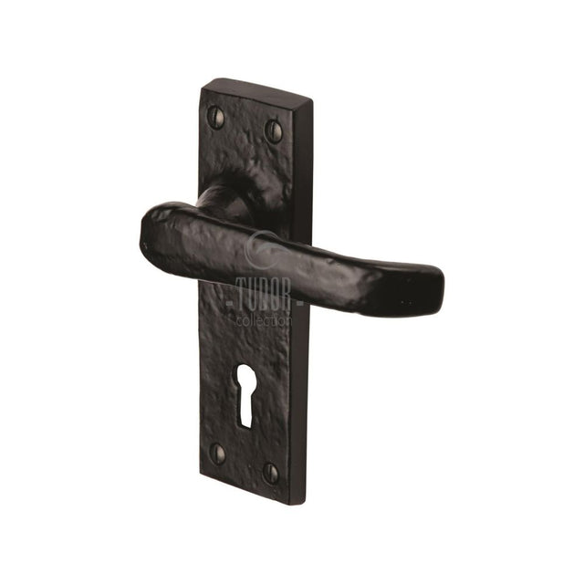 This is an image of a The Tudor Collection - Door Handle Lever Lock Windsor Design Black Iron, tc500 that is available to order from Trade Door Handles in Kendal.