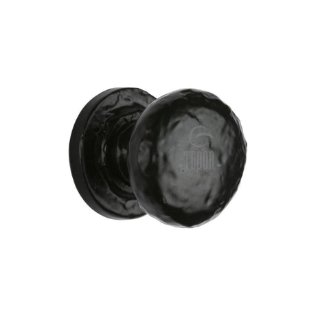 This is an image of a The Tudor Collection - Cabinet Knob Rustic Round Design 25mm Black Iron, tc532-25 that is available to order from Trade Door Handles in Kendal.