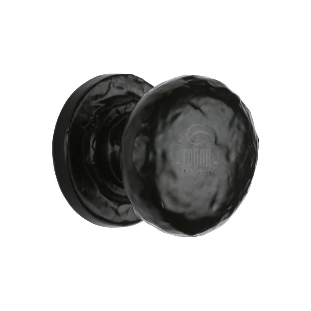 This is an image of a The Tudor Collection - Cabinet Knob Rustic Round Design 38mm Black Iron, tc532-38 that is available to order from Trade Door Handles in Kendal.