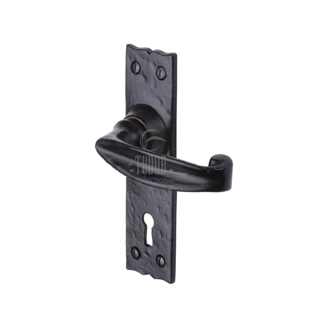 This is an image of a The Tudor Collection - Door Handle Lever Lock Wellington Design Black Iron, tc600 that is available to order from Trade Door Handles in Kendal.