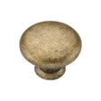 This is an image of a M.Marcus - Classic Round Knob 035mm Distressed Brass Finish, tk4226-035-dbs that is available to order from Trade Door Handles in Kendal.