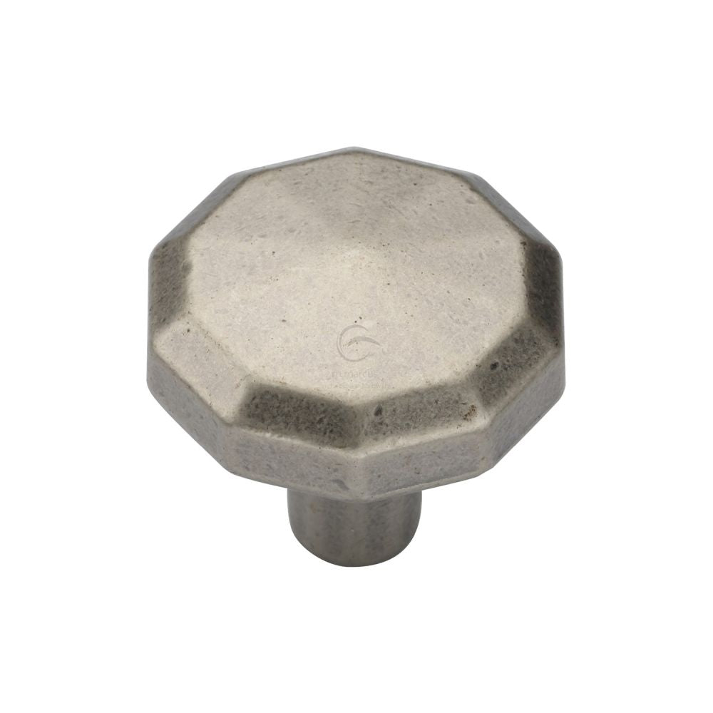 This is an image of a M.Marcus - Terre Cabinet Knob 032mm Distressed Pewter Finish, tk4231-032-dpw that is available to order from Trade Door Handles in Kendal.