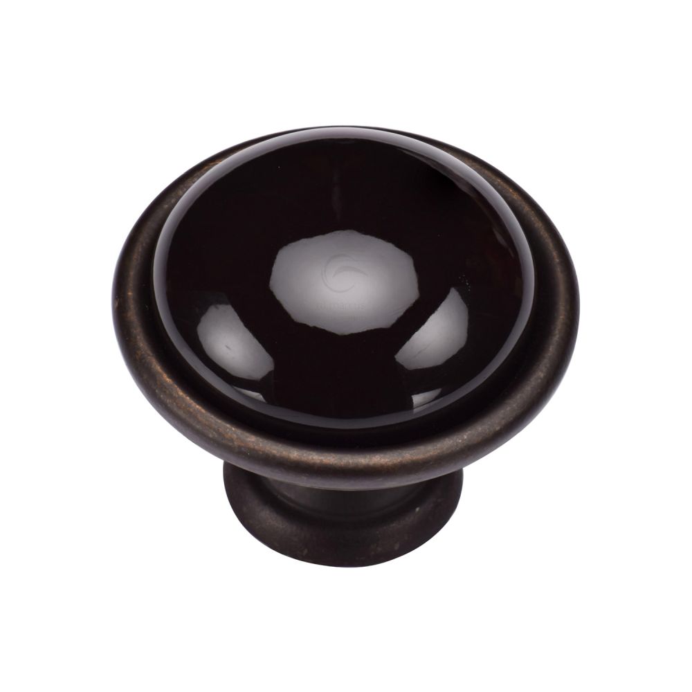 This is an image of a M.Marcus - Dome Cabinet Knob 040mm Matt Bronze Finish, tk4316-040-lbn that is available to order from Trade Door Handles in Kendal.