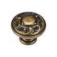 This is an image of a M.Marcus - Decorated Round Knob 035mm Distressed Brass Finish, tk4401-035-dbs that is available to order from Trade Door Handles in Kendal.