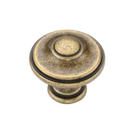 This is an image of a M.Marcus - Domed Round Knob 030mm Distressed Brass Finish, tk4408-030-dbs that is available to order from Trade Door Handles in Kendal.