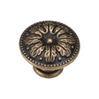 This is an image of a M.Marcus - Floral Round Knob 035mm Distressed Brass Finish, tk4479-035-dbs that is available to order from Trade Door Handles in Kendal.