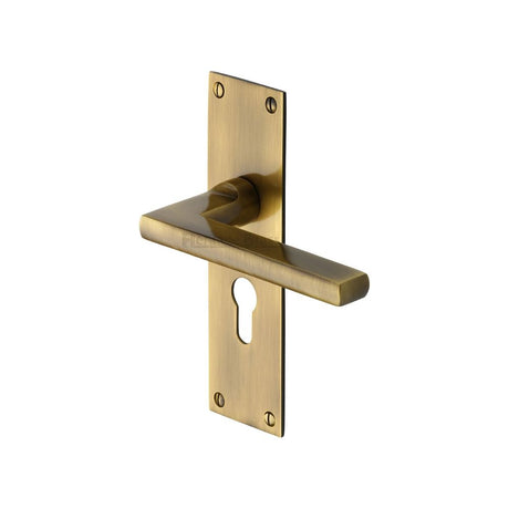 This is an image of a Heritage Brass - Door Handle Euro Profile Plate Trident Design Antique Brass Finish, tri1348-at that is available to order from Trade Door Handles in Kendal.