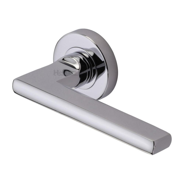 This is an image of a Heritage Brass - Door Handle Lever Latch on Round Rose Trident Design Polished Chrom, tri1352-pc that is available to order from Trade Door Handles in Kendal.