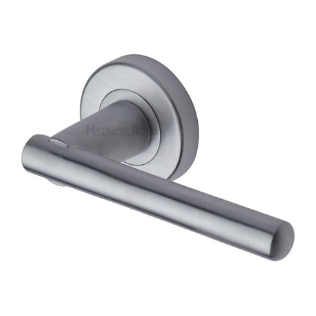 This is an image of a Heritage Brass - Door Handle Lever Latch on Round Rose Challenger Design Satin Ch, v1001-sc that is available to order from Trade Door Handles in Kendal.