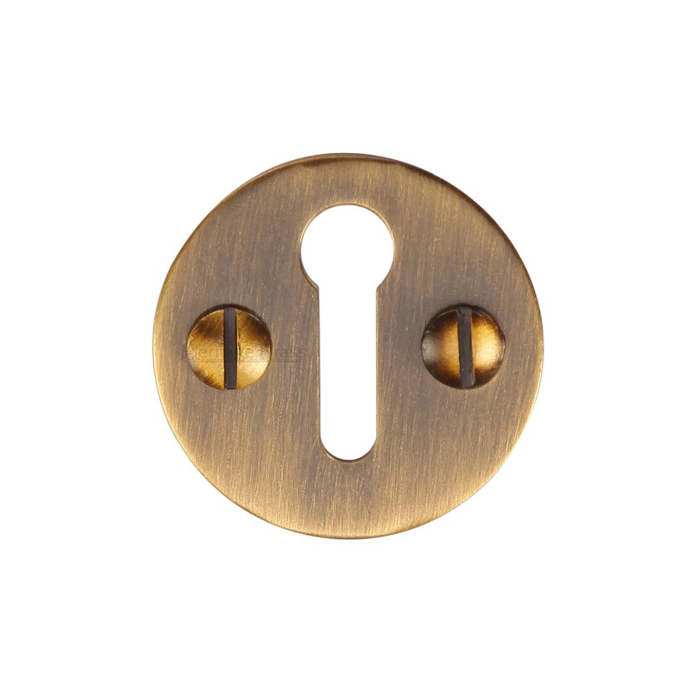 This is an image of a Heritage Brass - Keyhole Escutcheon Antique Brass Finish, v1010-at that is available to order from Trade Door Handles in Kendal.