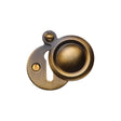 This is an image of a Heritage Brass - Covered Keyhole Round Antique Brass Finish, v1020-at that is available to order from Trade Door Handles in Kendal.