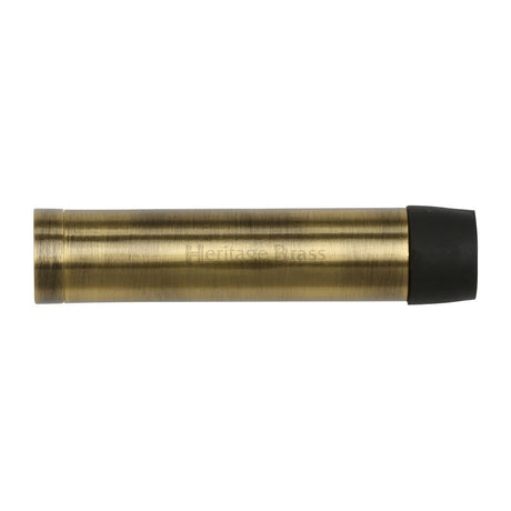 This is an image of a Heritage Brass - Cylindrical Door Stop Without Rose 64mm Antique Brass Finish, v1081-64-at that is available to order from Trade Door Handles in Kendal.