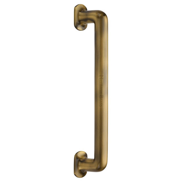 This is an image of a Heritage Brass - Door Pull Handle Traditional Design 330mm Antique Brass Finish, v1376-330-at that is available to order from Trade Door Handles in Kendal.