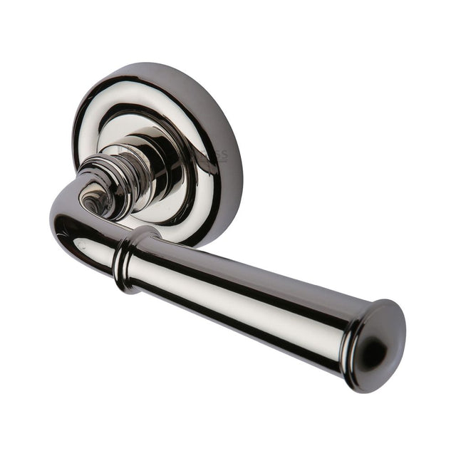 This is an image of a Heritage Brass - Door Handle Lever Latch on Round Rose Colonial Design Polished Nick, v1932-pnf that is available to order from Trade Door Handles in Kendal.