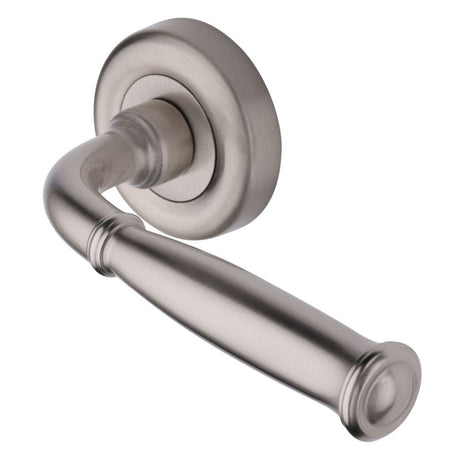 This is an image of a Heritage Brass - Door Handle Lever Latch on Round Rose Lincoln Design Satin Nicke, v1938-sn that is available to order from Trade Door Handles in Kendal.