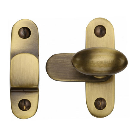 This is an image of a Heritage Brass - Showcase Fastener Antique Brass Finish, v1970-at that is available to order from Trade Door Handles in Kendal.