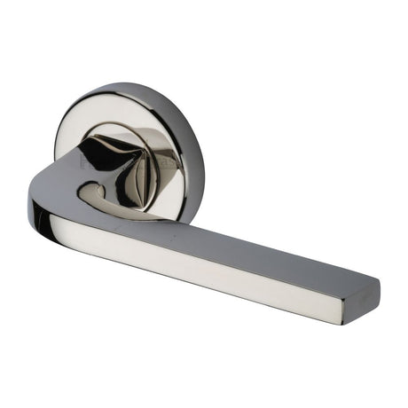 This is a image of a Heritage Brass - Door Handle Lever on Rose Bellagio Design Pol. Nickel Finish that is available to order from Trade Door Handles in Kendal