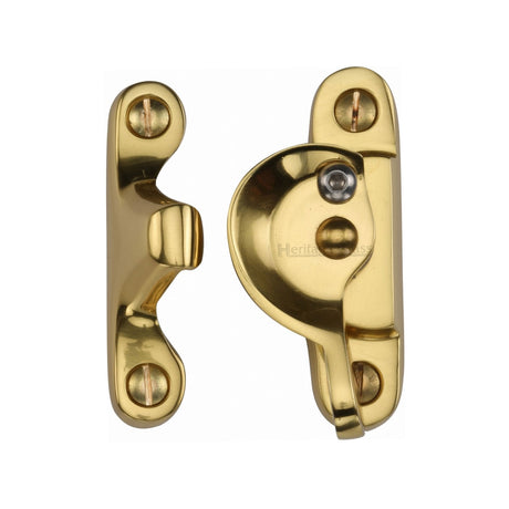This is an image of a Heritage Brass - Fitch Pattern Sash Fastener Lockable Unlacquered Brass Finish, v2060l-ulb that is available to order from Trade Door Handles in Kendal.
