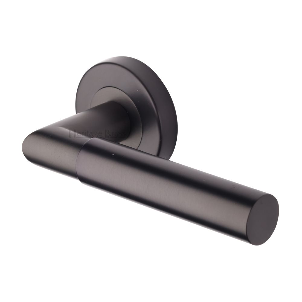 This is an image of a Heritage Brass - Door Handle Lever Latch on Round Rose Bauhaus Mitre Design Matt, v2270-mb that is available to order from Trade Door Handles in Kendal.