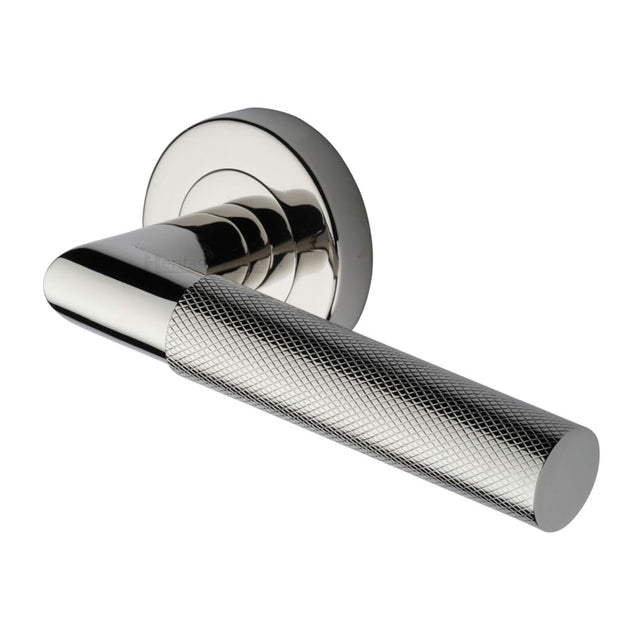 This is an image of a Heritage Brass - Door Handle Lever Latch on Round Rose Bauhaus Mitre Knurled Des, v2272-pnf that is available to order from Trade Door Handles in Kendal.