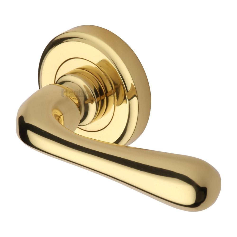 This is an image of a Heritage Brass - Door Handle Lever Latch on Round Rose Charlbury Design Polished Bra, v3020-pb that is available to order from Trade Door Handles in Kendal.